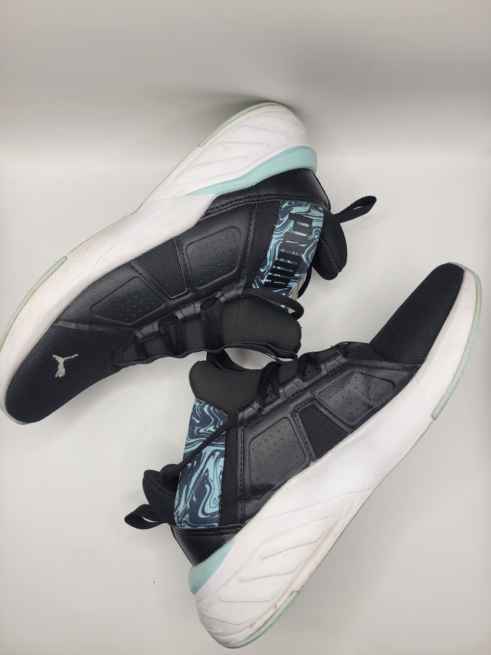 Puma Black Athletic Shoes with Teal Marble Accents